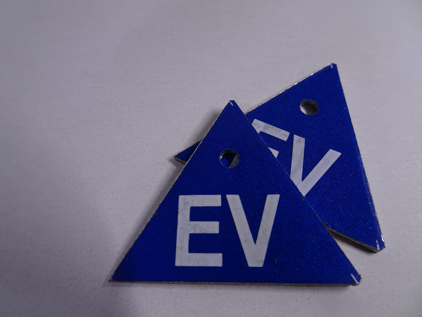 EV Triangle with colour matched rivet